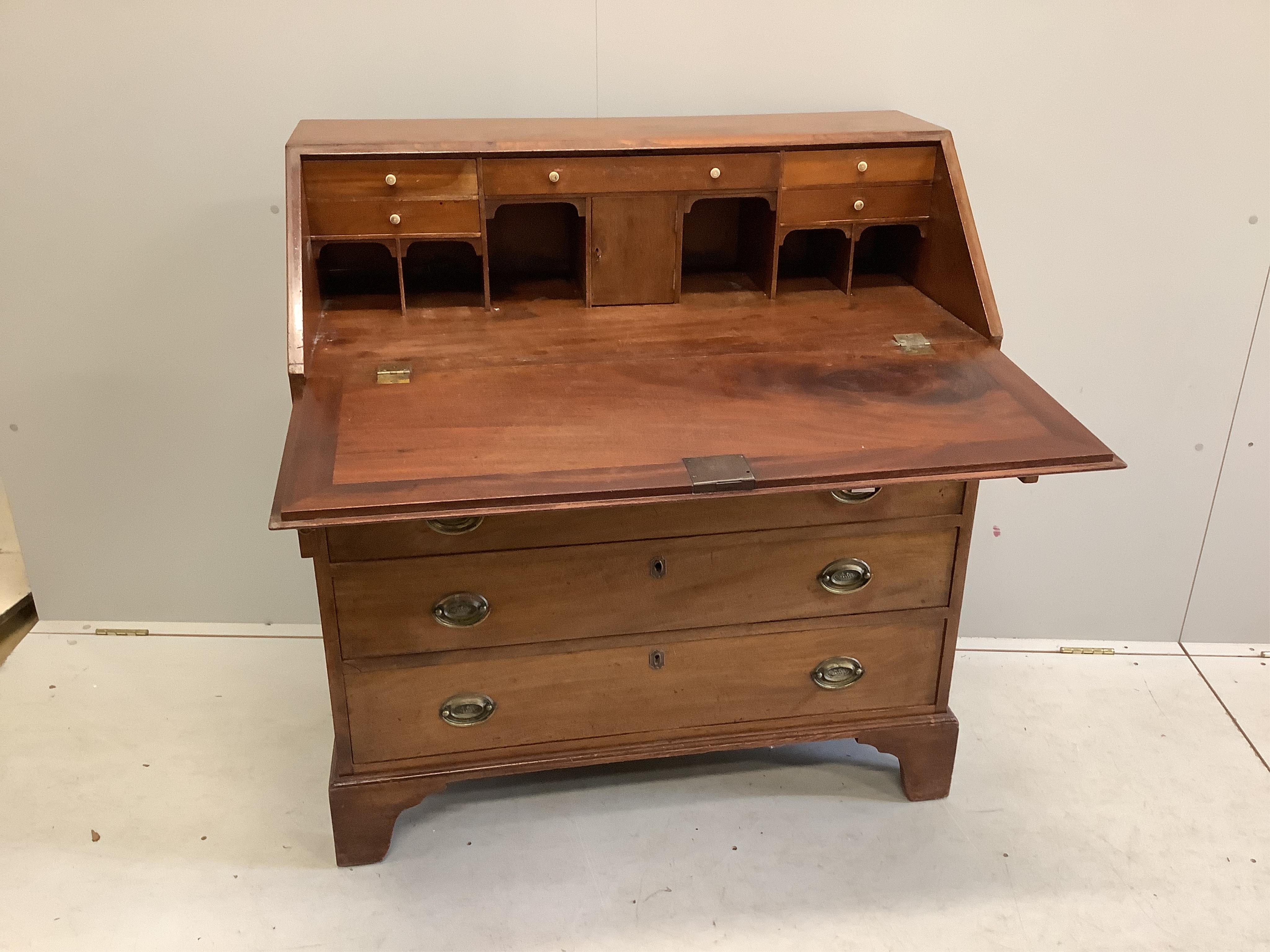 A George III mahogany bureau, width 98cm, depth 52cm, height 107cm. Condition - poor to fair